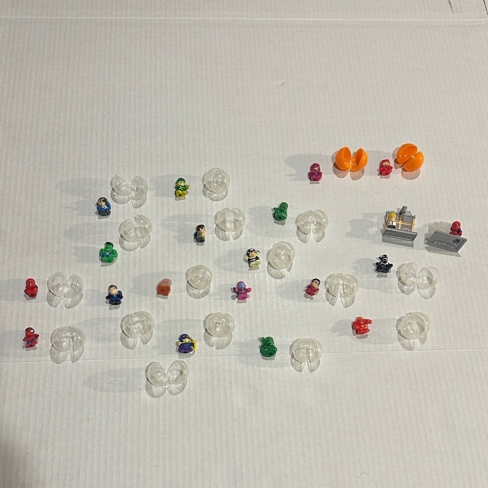 Lot of 20 squinkies Colorful Miniature Toys are flexible and come w containers